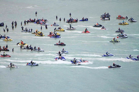 Some of the 84 adventurous jet ski riders prepare to set out across the Gulf of Thailand.